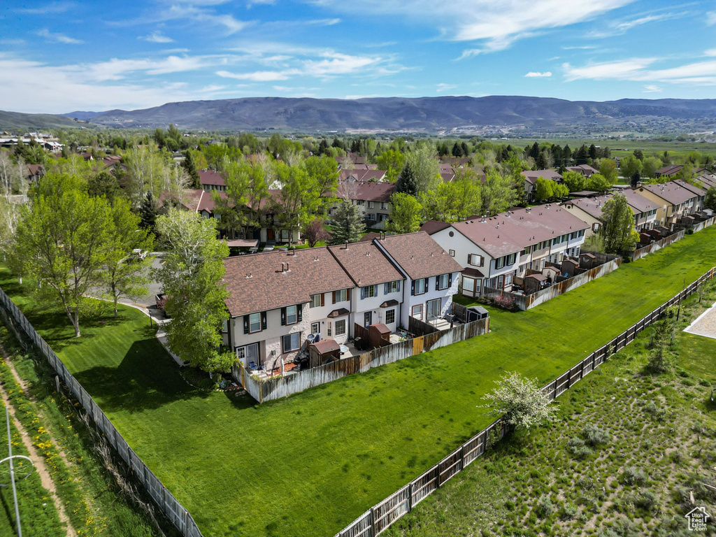 Aerial perspective of suburban area with mountains
