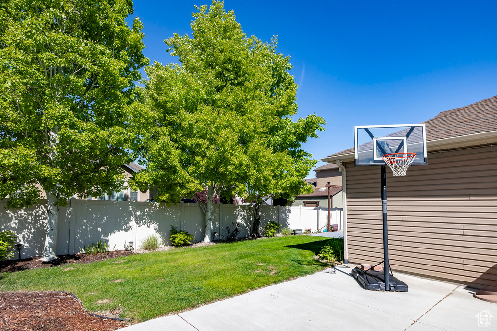 View of yard featuring a patio and a fenced backyard