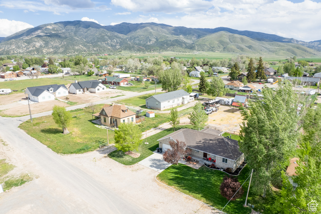 Aerial view of residential area featuring mountains