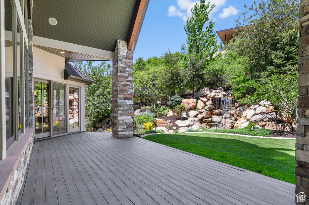 Wooden deck with a lawn