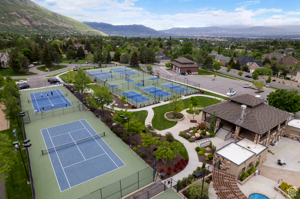 Aerial view of residential area with a mountainous background