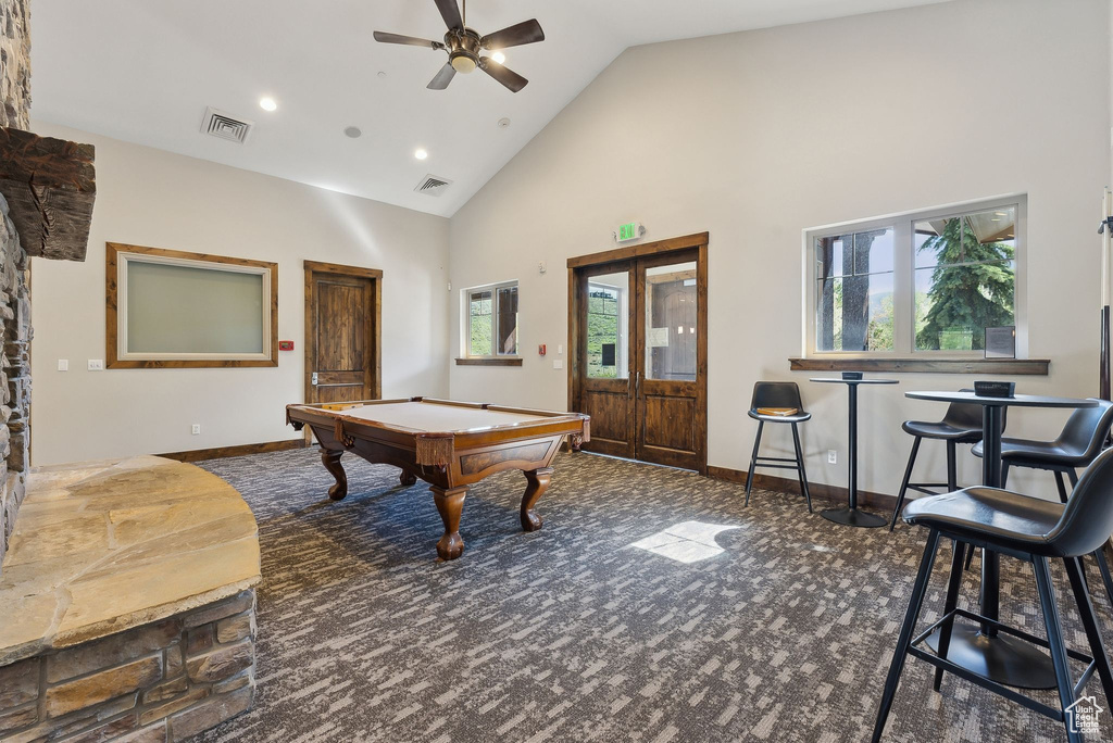Recreation room featuring carpet, pool table, high vaulted ceiling, ceiling fan, and recessed lighting