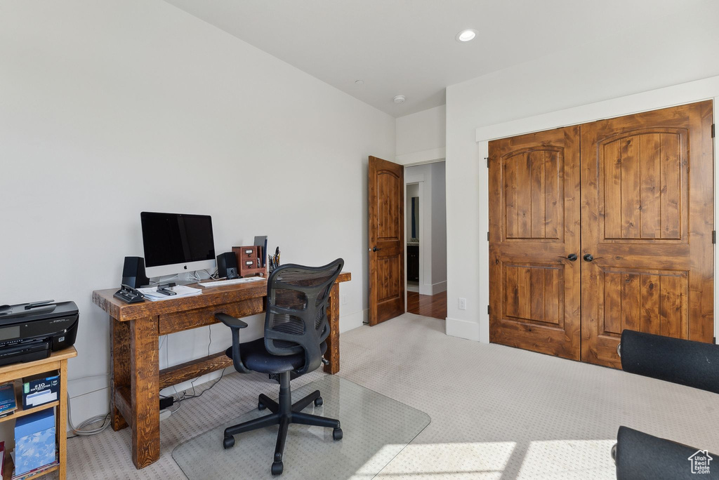 Carpeted home office featuring recessed lighting