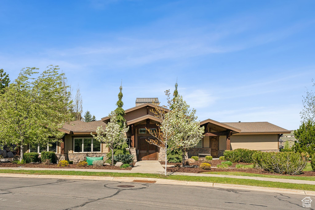 View of front of home featuring stone siding