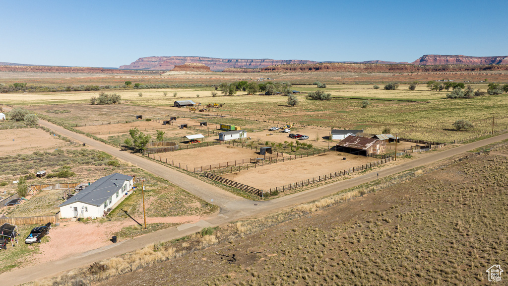 Aerial view of sparsely populated area featuring a mountain backdrop