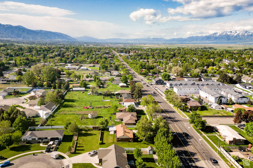 Aerial view of residential area featuring a mountain backdrop