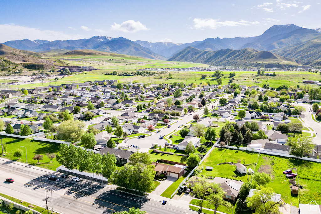 Aerial view of residential area with a mountainous background