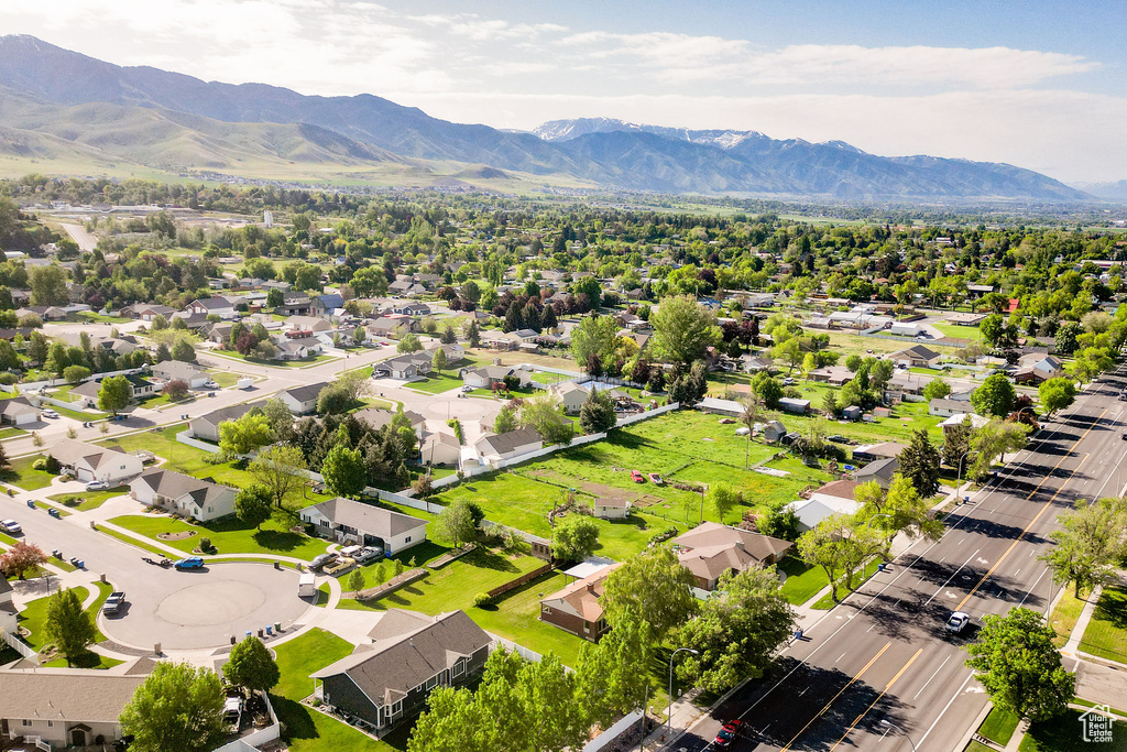 Aerial view of residential area with a mountainous background