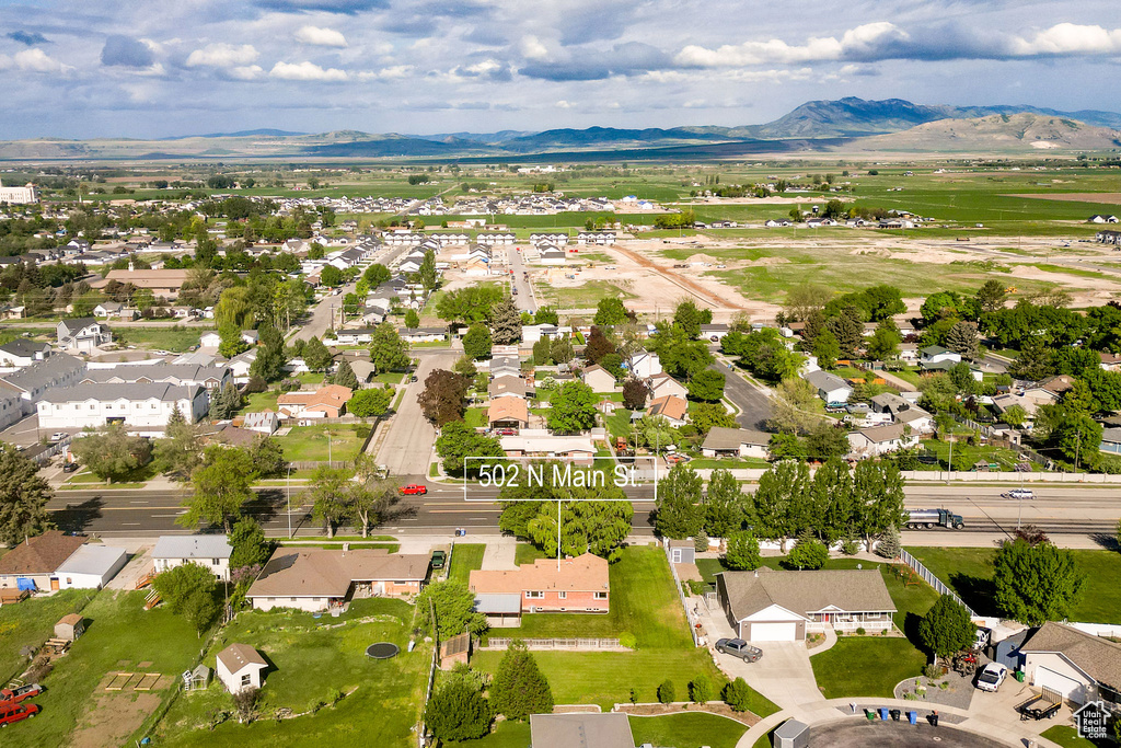 Aerial perspective of suburban area with mountains