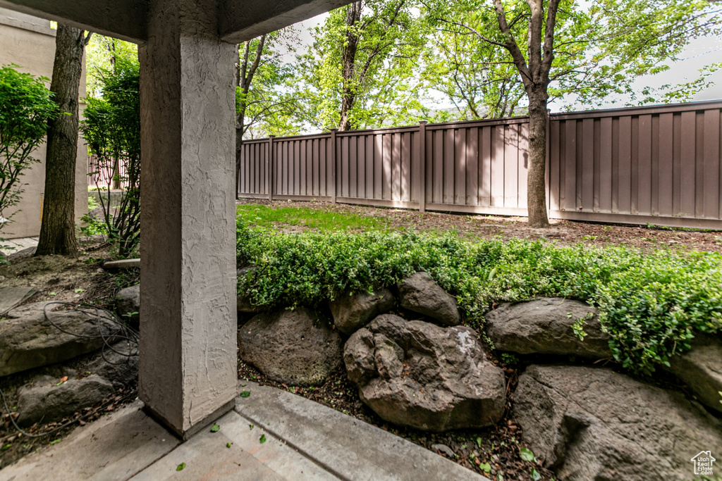 View of fenced backyard