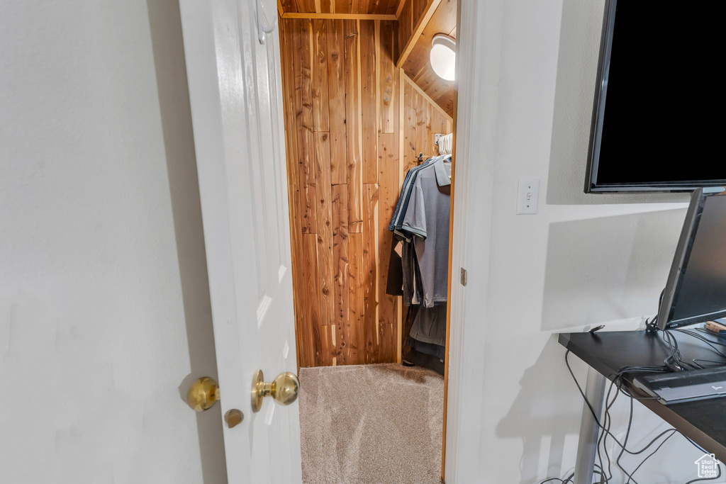 Walk in closet featuring carpet flooring