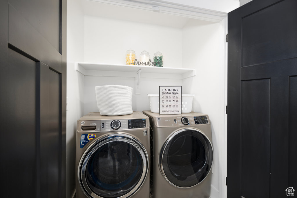 Laundry area featuring washer and clothes dryer