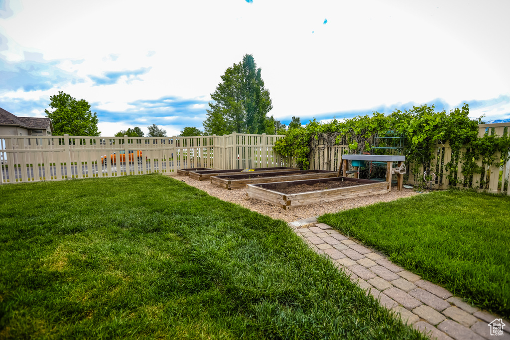 View of yard with a garden