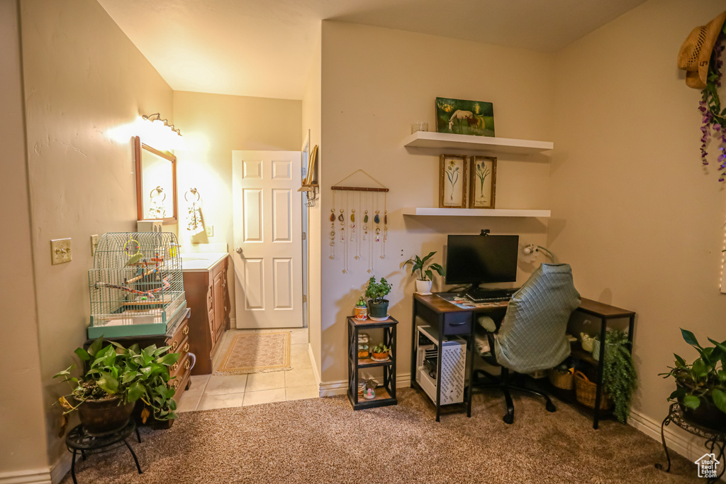 Office featuring baseboards and light carpet