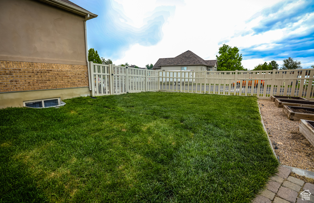 View of yard with a garden