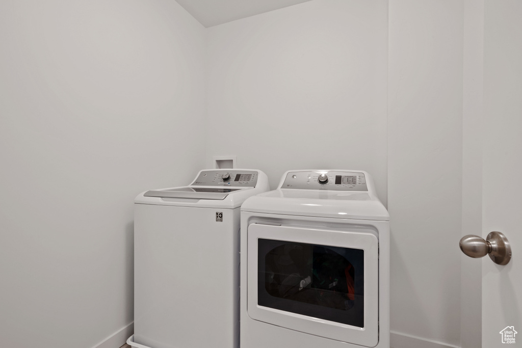 Laundry area featuring washing machine and dryer