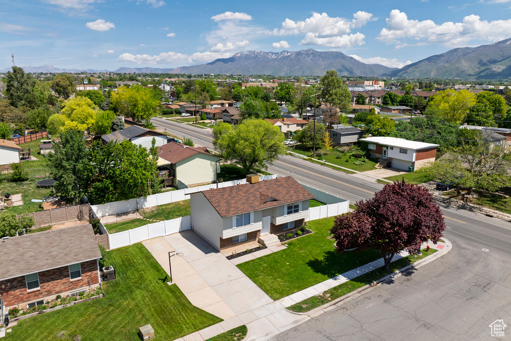 Aerial perspective of suburban area with mountains