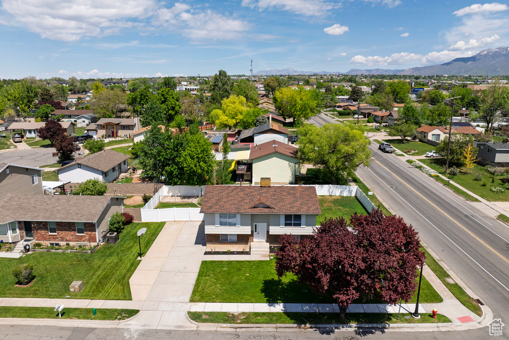 Aerial view of residential area with a mountainous background