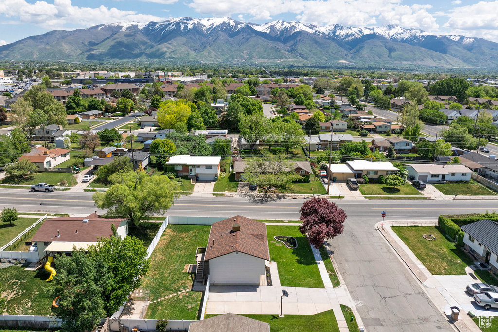 Aerial view of residential area with a mountainous background