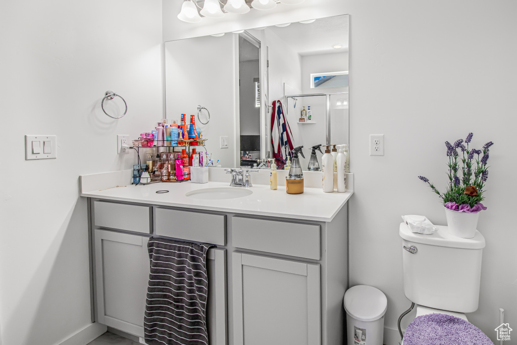 Bathroom with vanity and toilet