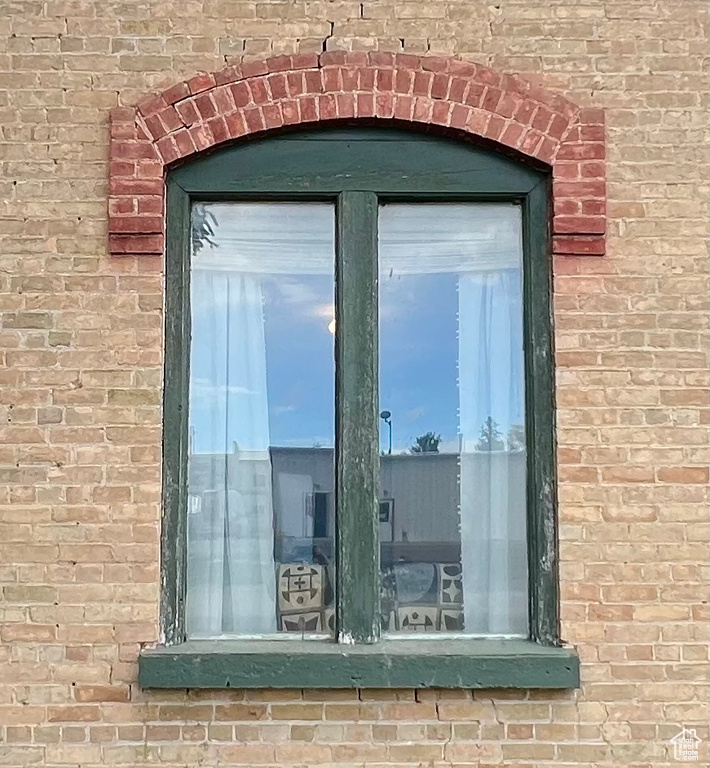 Property entrance with brick siding
