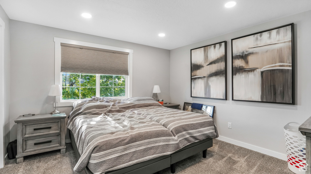 Bedroom featuring recessed lighting, carpet, and baseboards