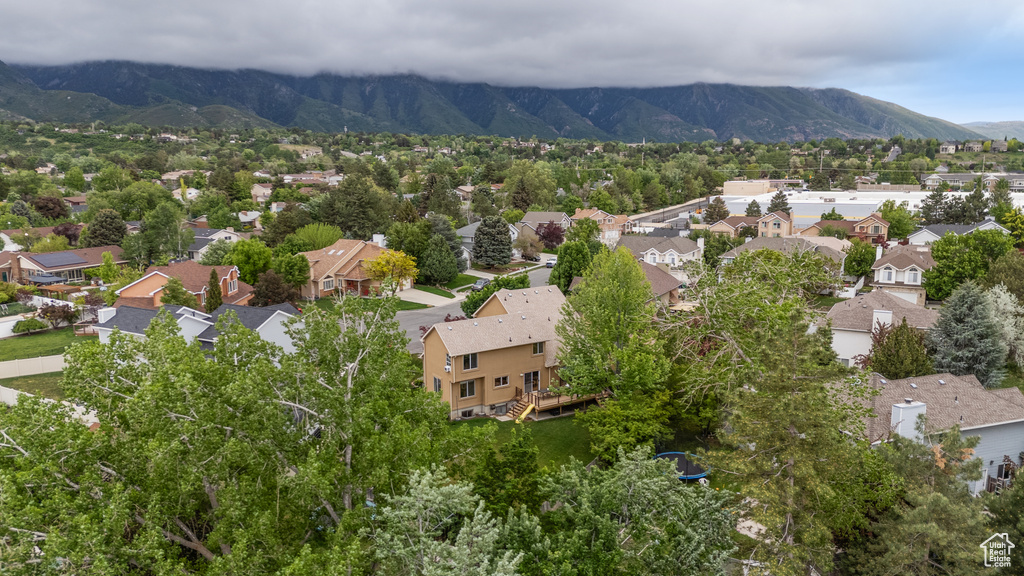 Aerial perspective of suburban area featuring mountains