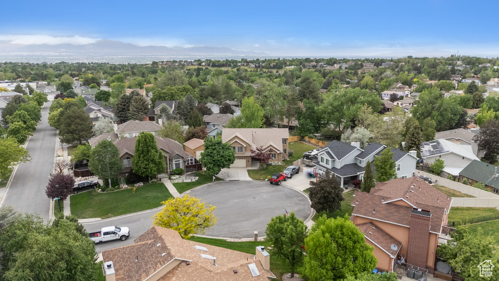 Aerial view of residential area with a mountain backdrop