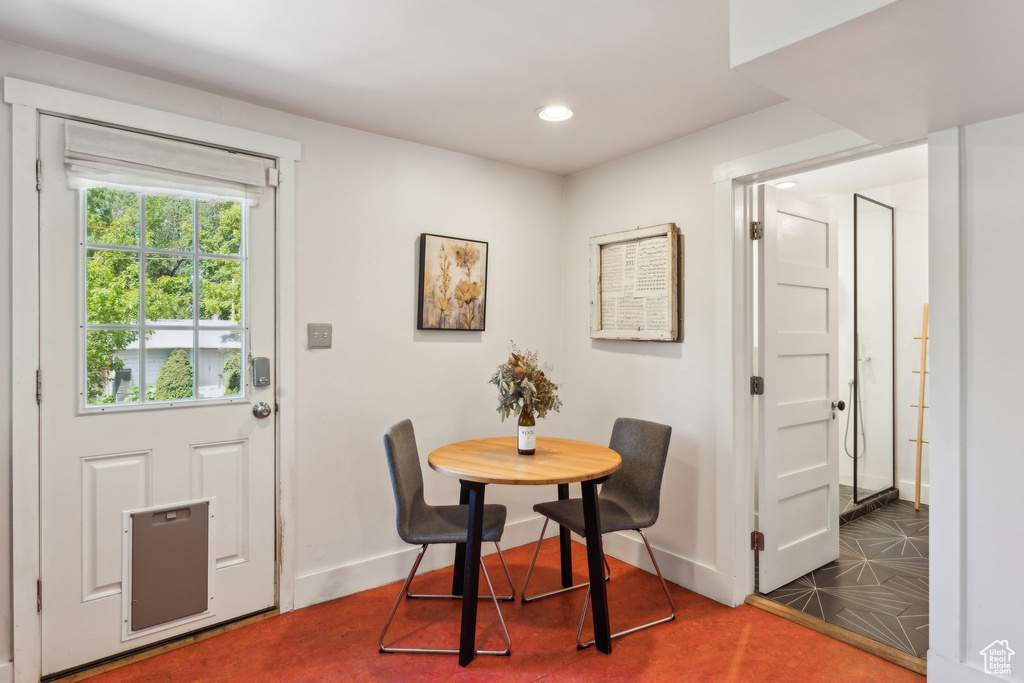 Dining area with baseboards and recessed lighting