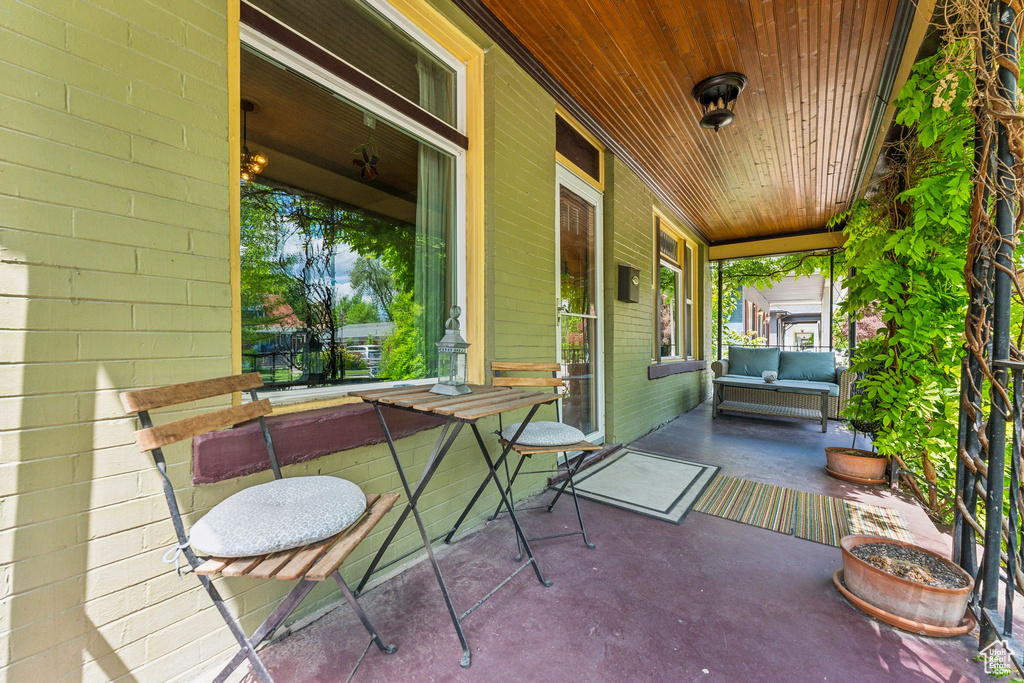 View of patio with a porch