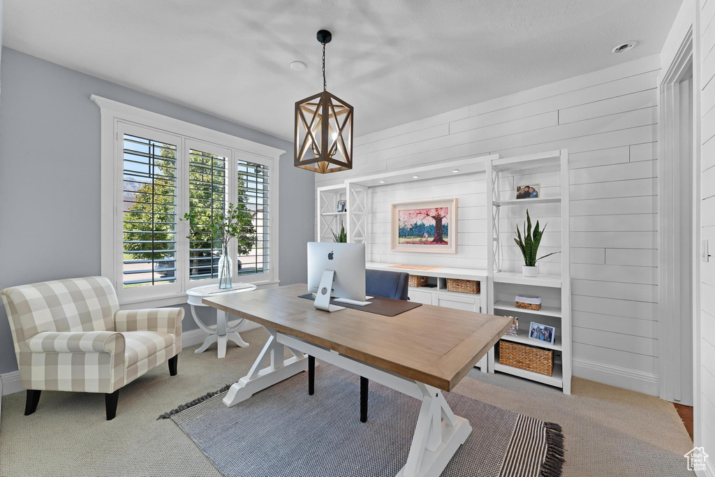 Office with carpet and baseboards