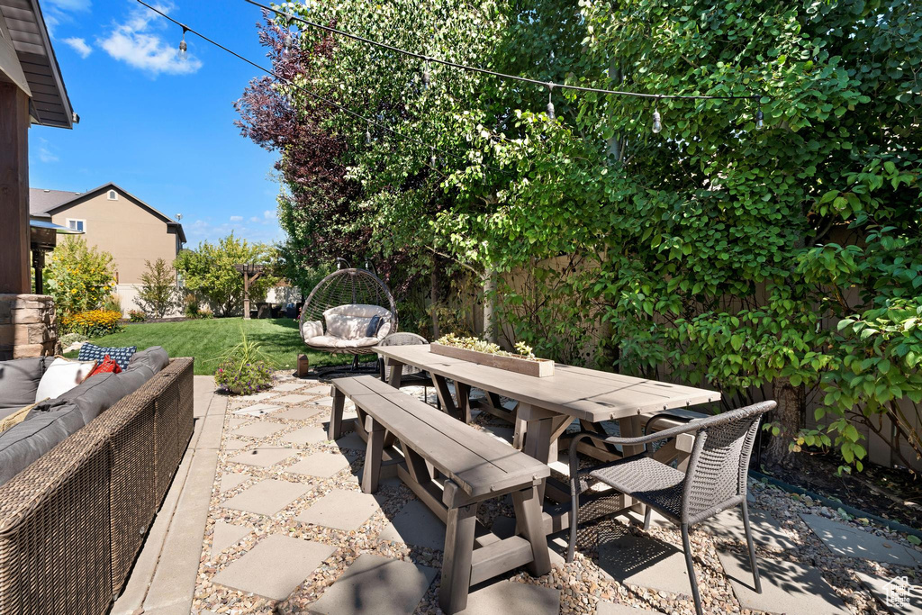 View of patio featuring outdoor dining space and outdoor lounge area