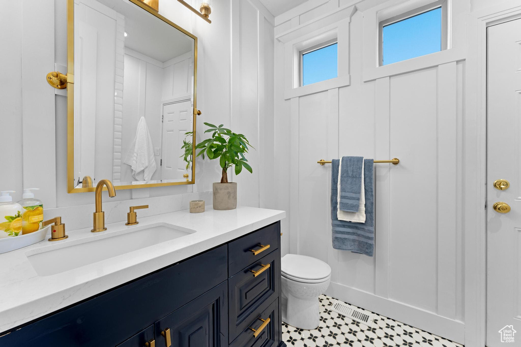 Bathroom featuring toilet and vanity