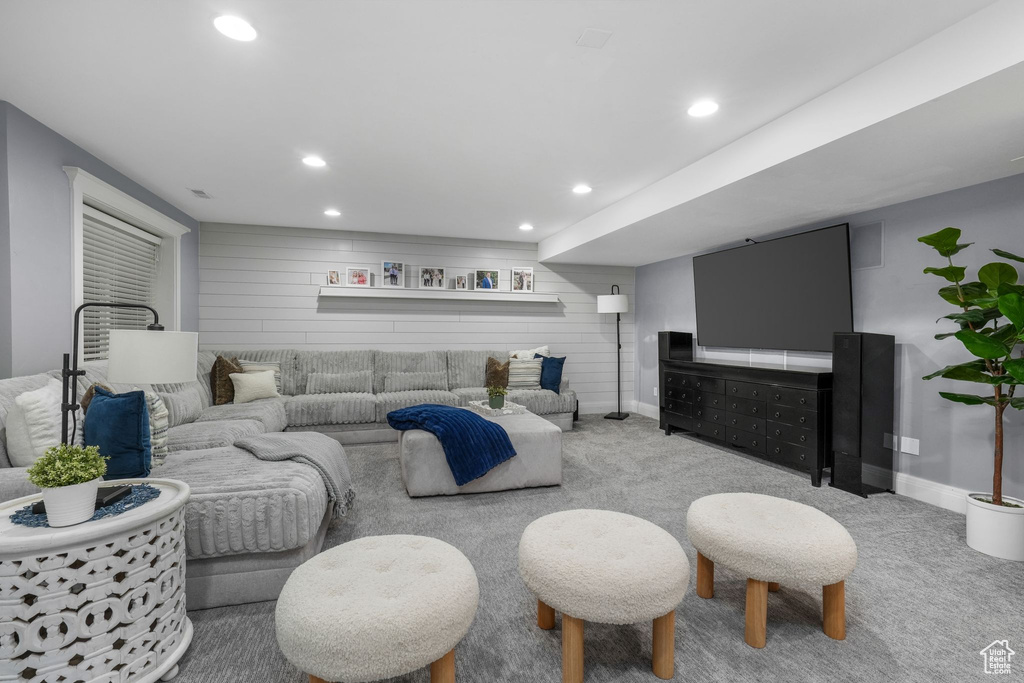 Living room featuring recessed lighting and carpet floors