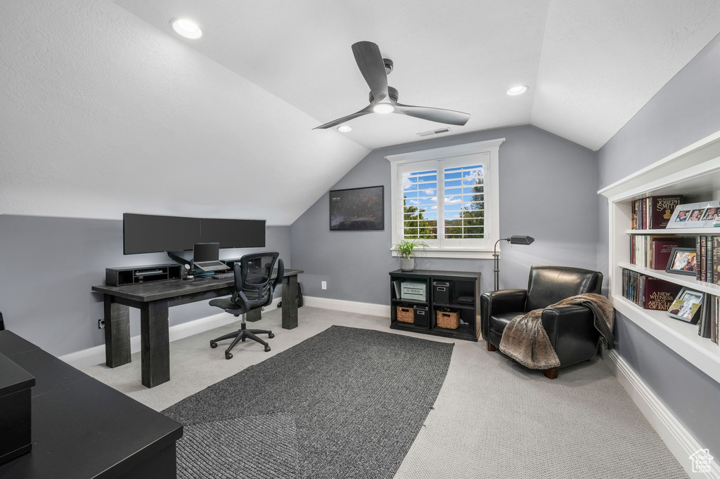 Office area featuring ceiling fan, lofted ceiling, carpet flooring, and recessed lighting
