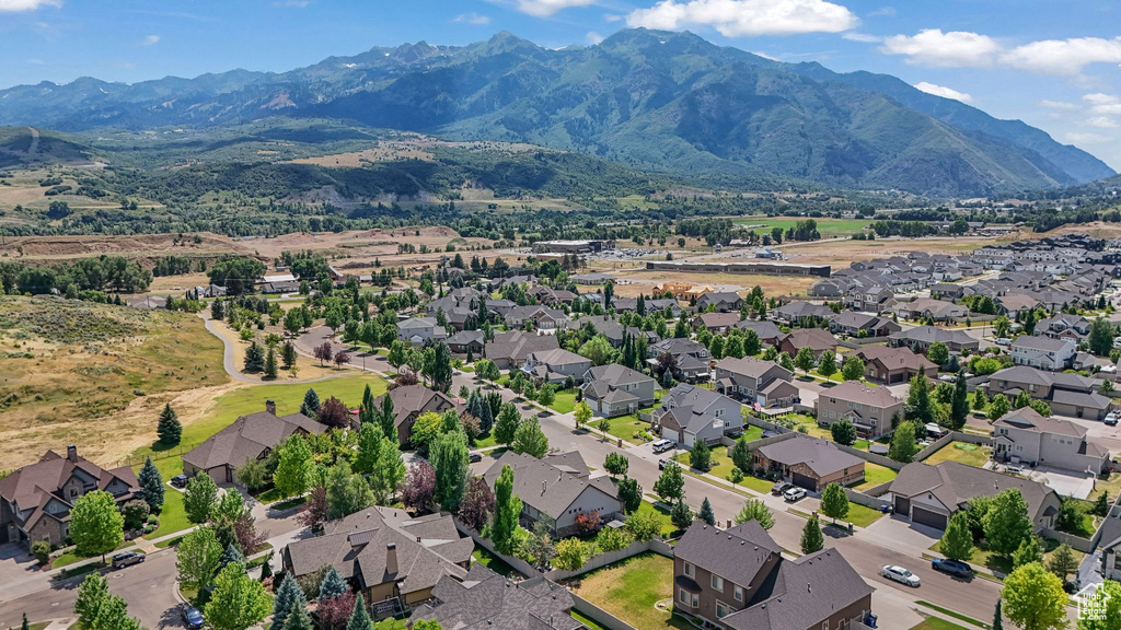 Aerial perspective of suburban area featuring mountains