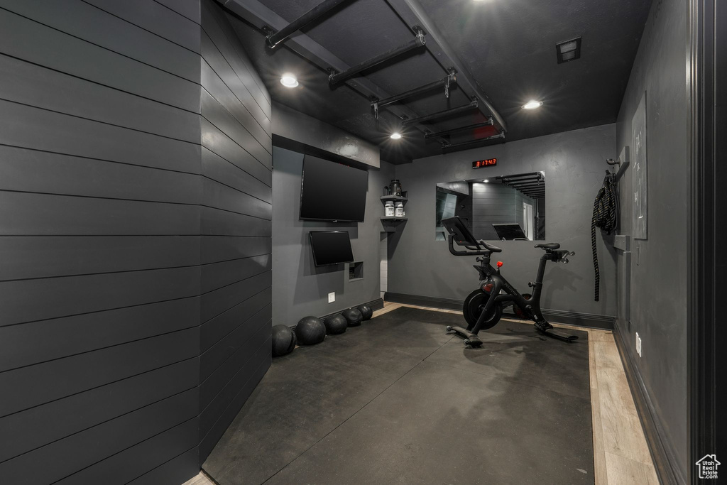 Exercise area featuring baseboards