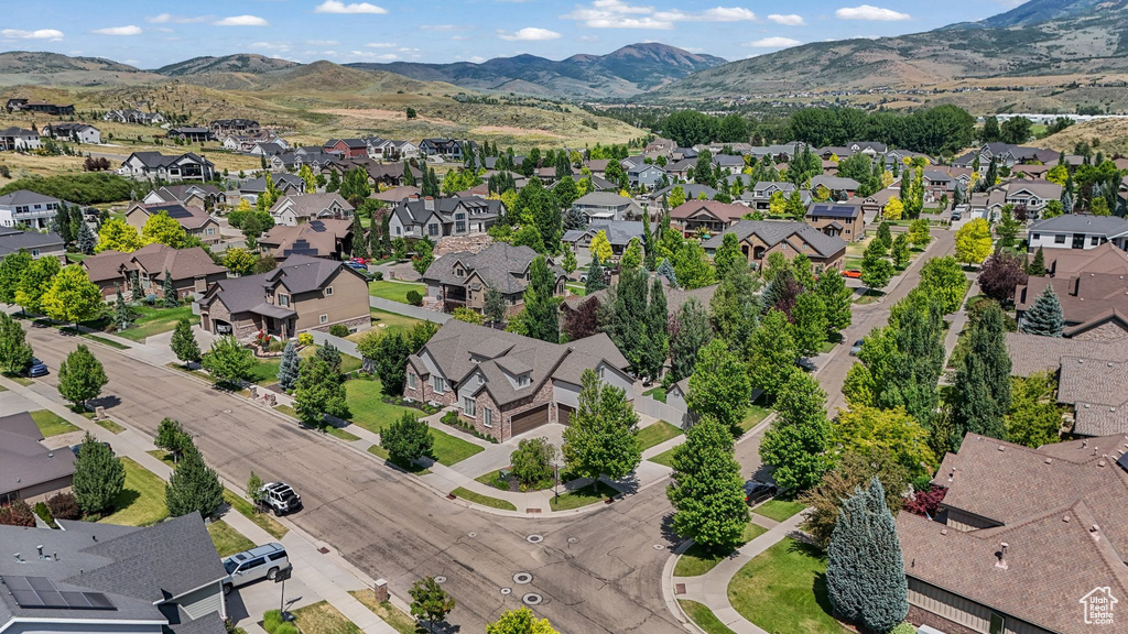 Aerial perspective of suburban area with mountains