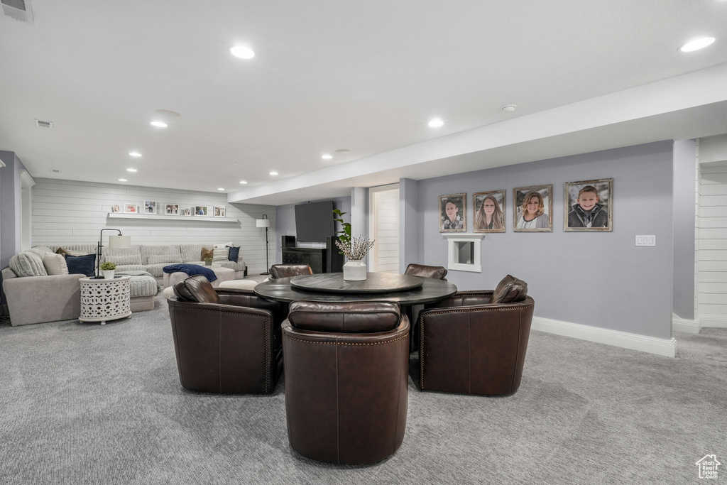 Dining area with carpet and recessed lighting