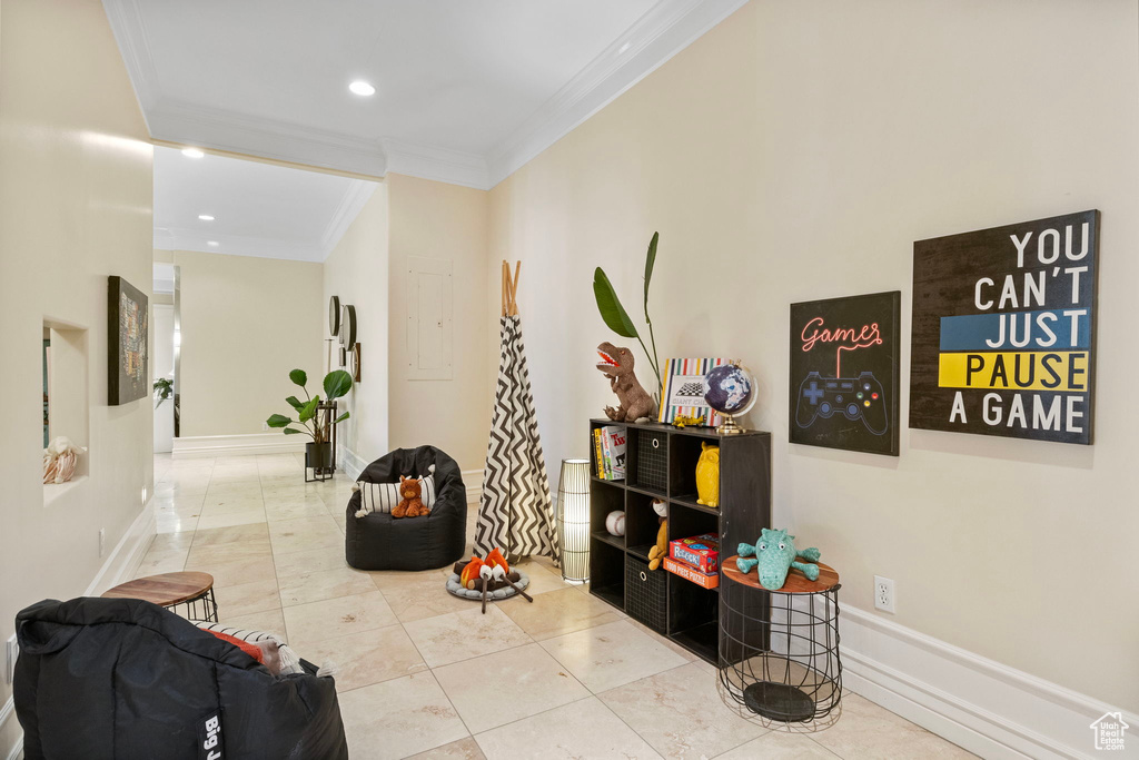 Hallway featuring crown molding, recessed lighting, tile patterned flooring, and baseboards
