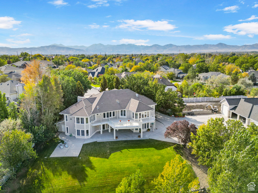 Aerial perspective of suburban area featuring mountains