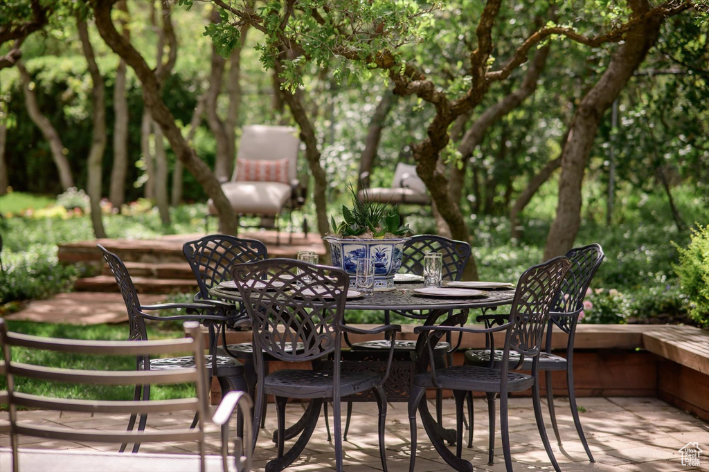 Wooden deck featuring outdoor dining area