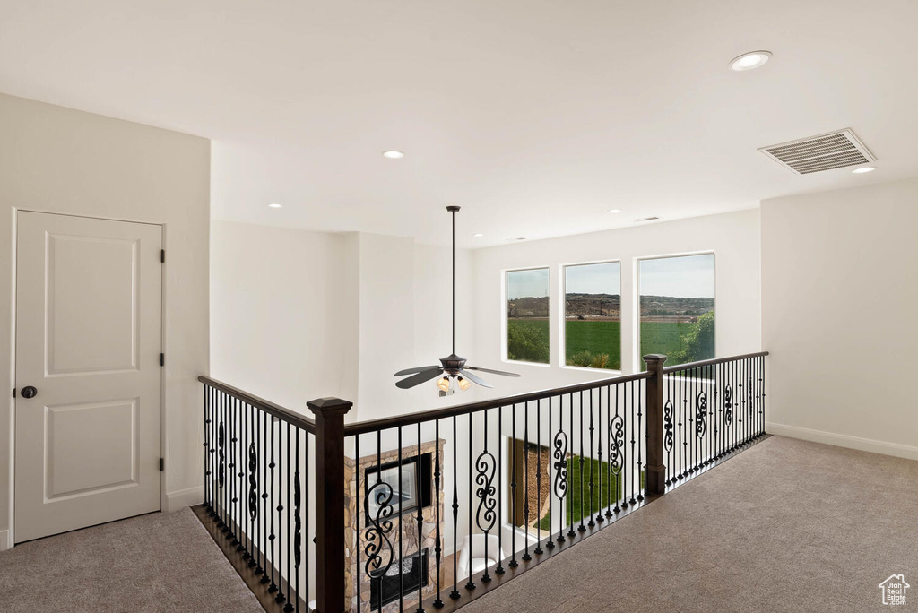 Hall featuring carpet floors, recessed lighting, and baseboards