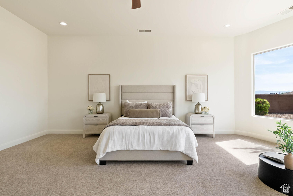 Bedroom featuring carpet, baseboards, a ceiling fan, and recessed lighting