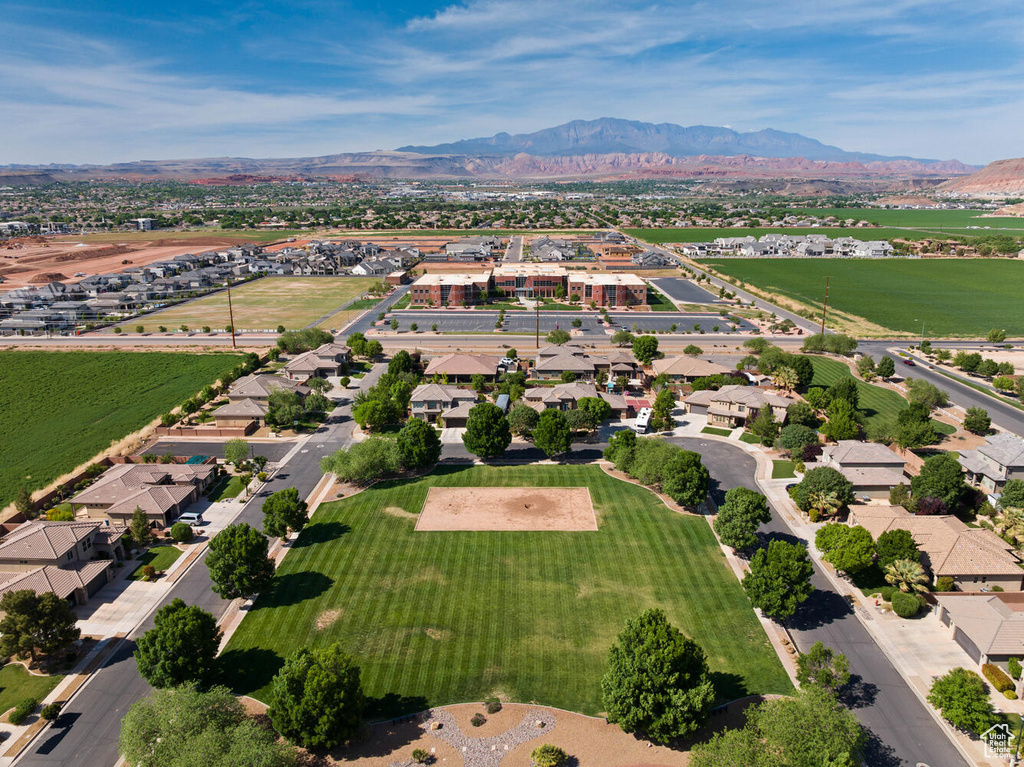 Aerial view of residential area featuring mountains