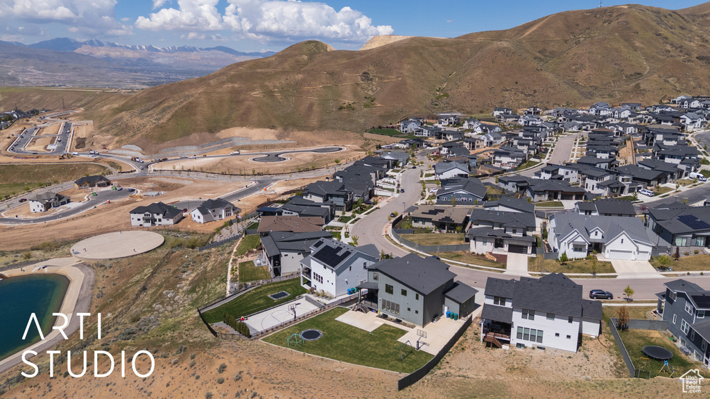 Aerial view featuring a residential view and a mountain view