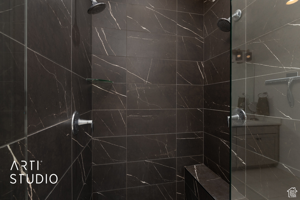 Bathroom with tiled shower