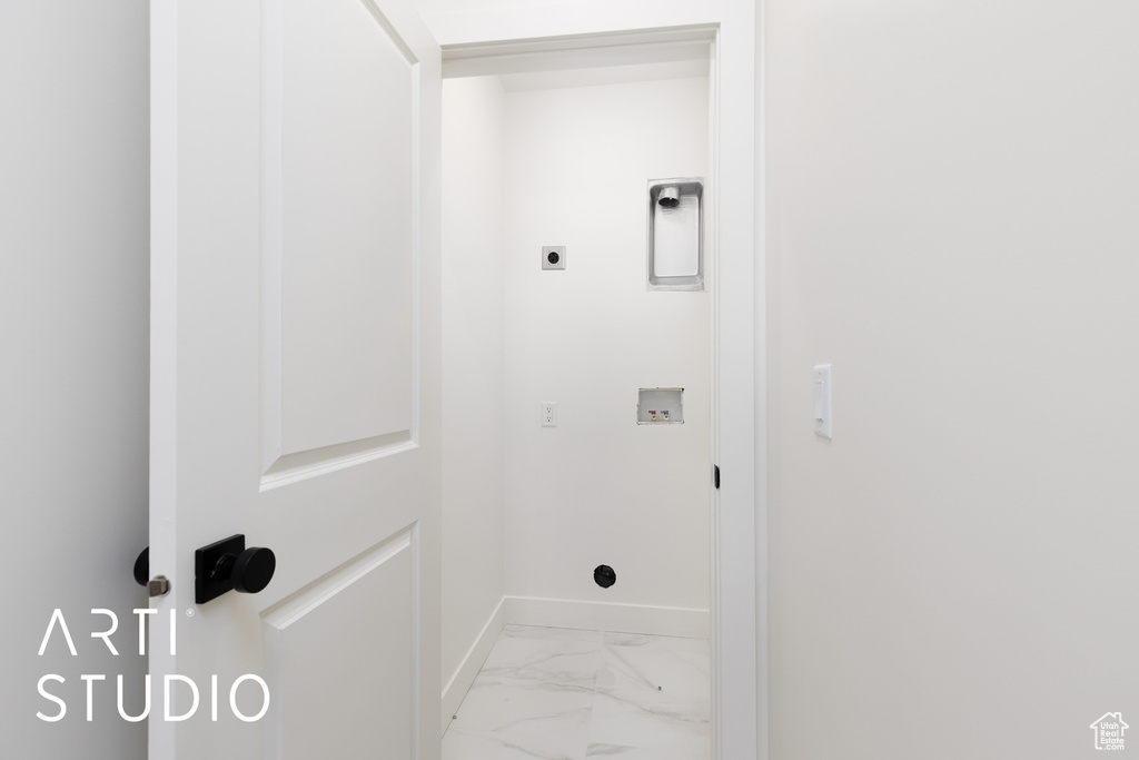 Clothes washing area featuring washer hookup, laundry area, electric dryer hookup, baseboards, and marble finish floor