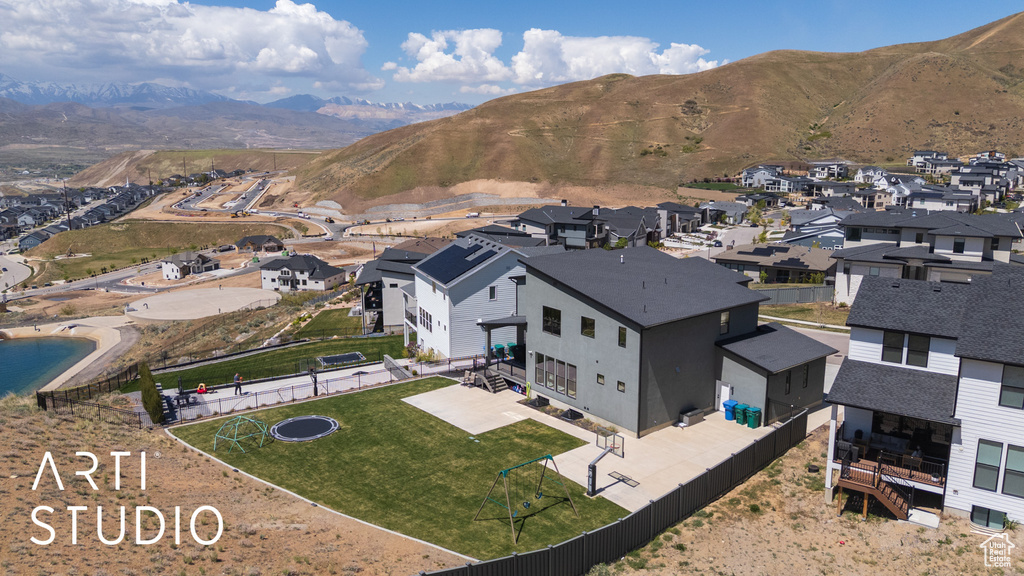 Aerial view featuring a residential view and a mountain view