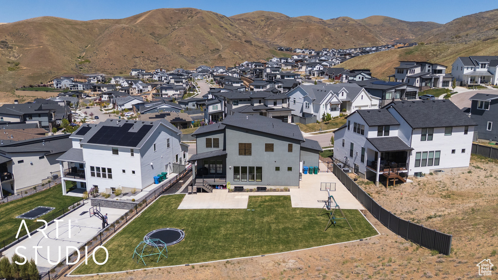 Aerial view featuring a residential view and a mountain view